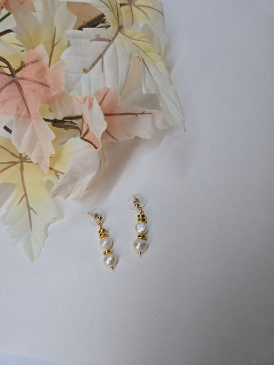Pearl Elegance Gold-Tone Drop Earrings with white bead accents on gold-tone links, view 2