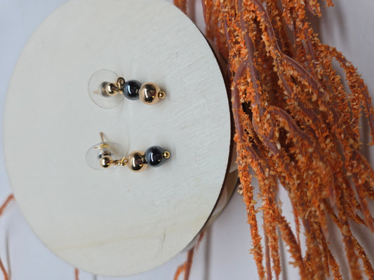 Twilight Drops Earrings with two black hematite beads and gold-tone accents, view 2
