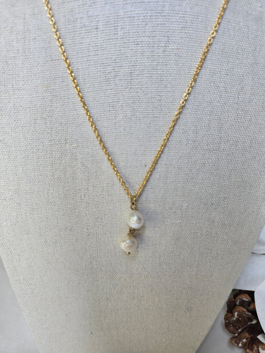 Soft Elegance Necklace with two pearls in a drop design on a gold-tone chain, view 2