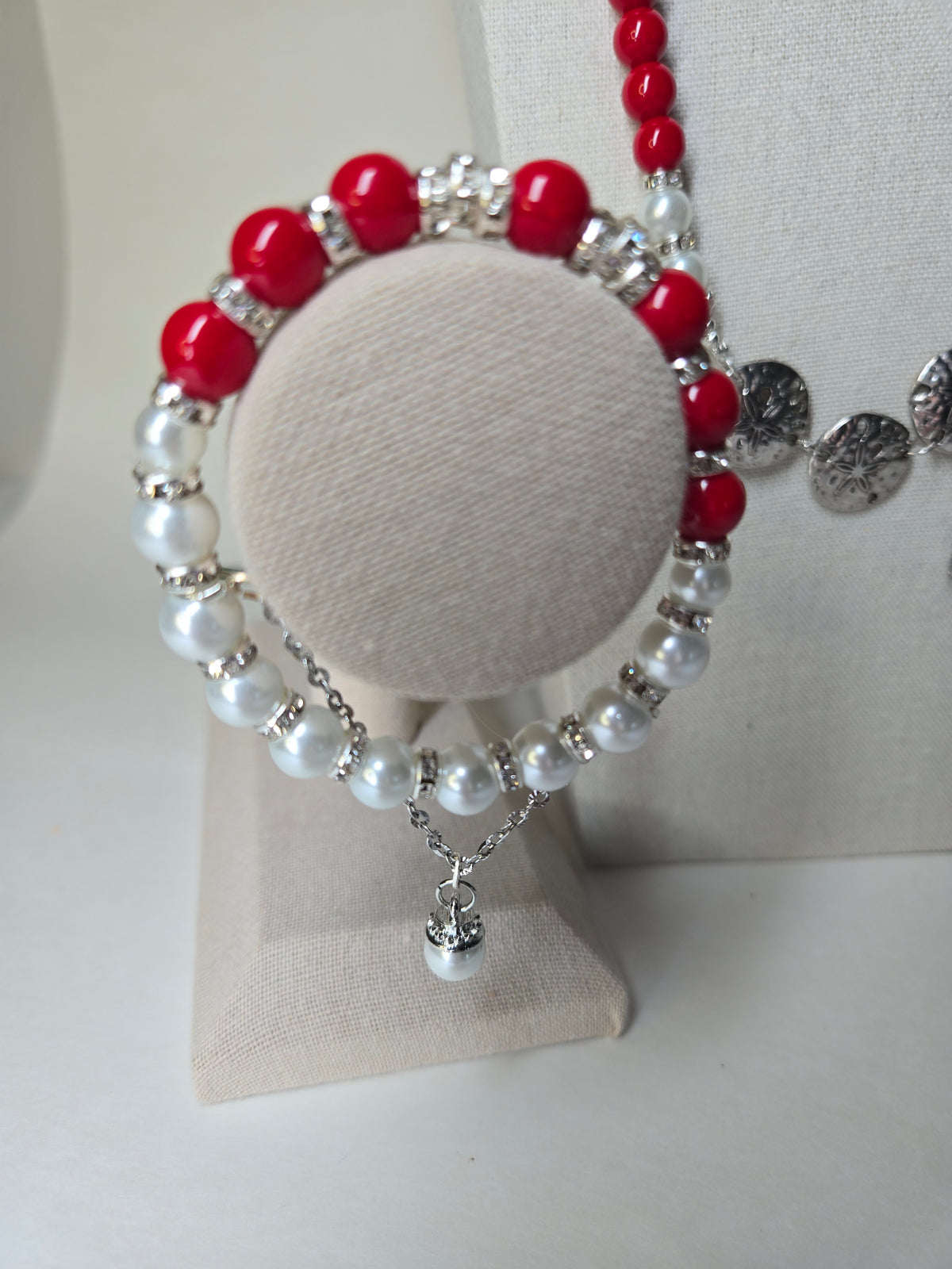 Cherry Touch Set, a necklace and bracelet of red beads, white pearls and silver accents, view 2