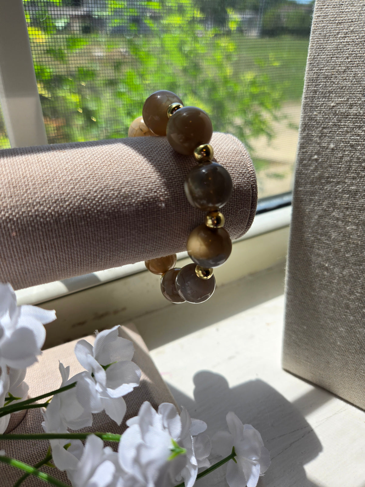 Golden Earth Bracelet with smooth, round natural stone beads in creamy tones, view 2
