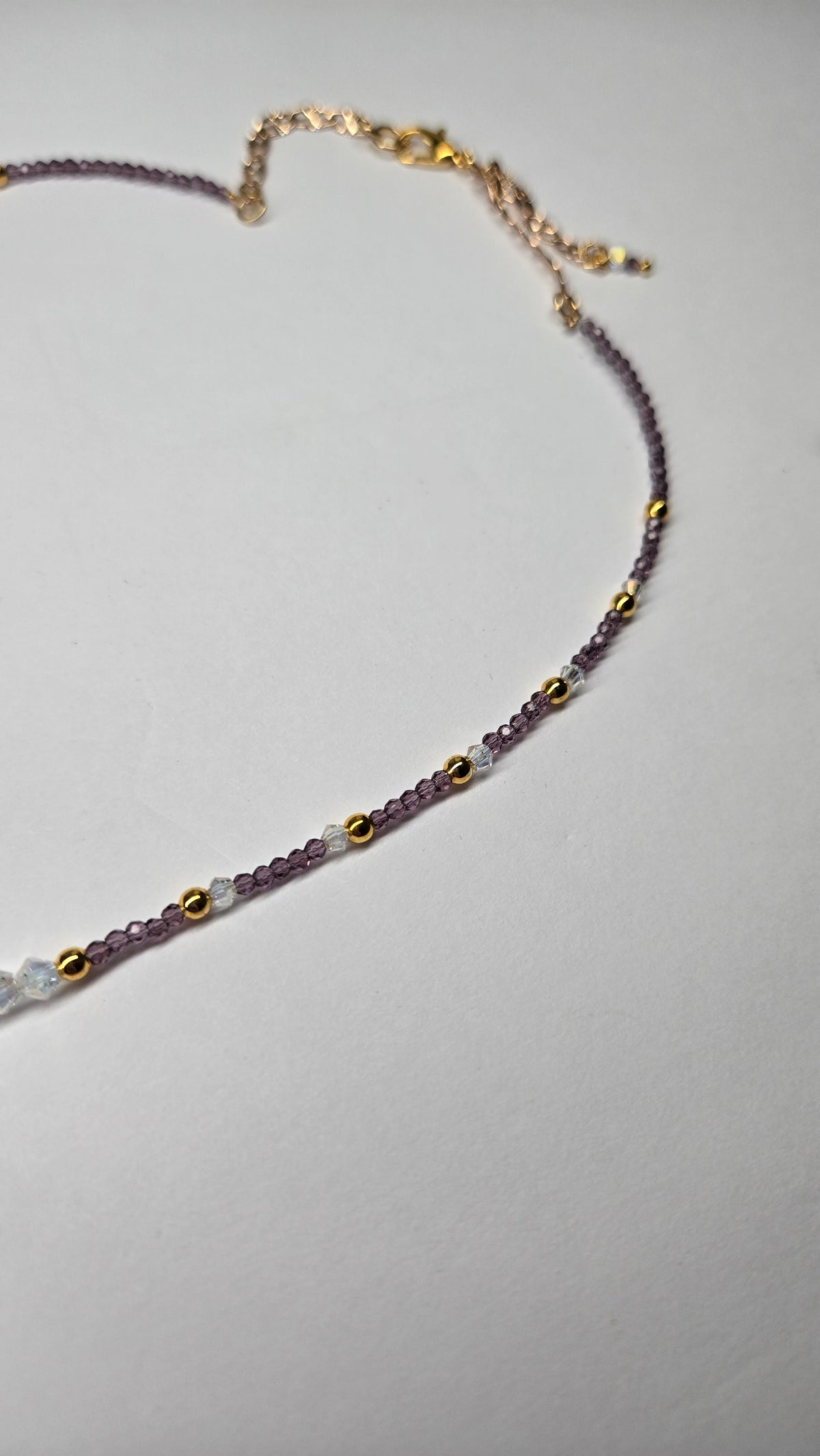 Lavender Drops Necklace with seven lavender teardrop drops on purple and clear beads, view 5