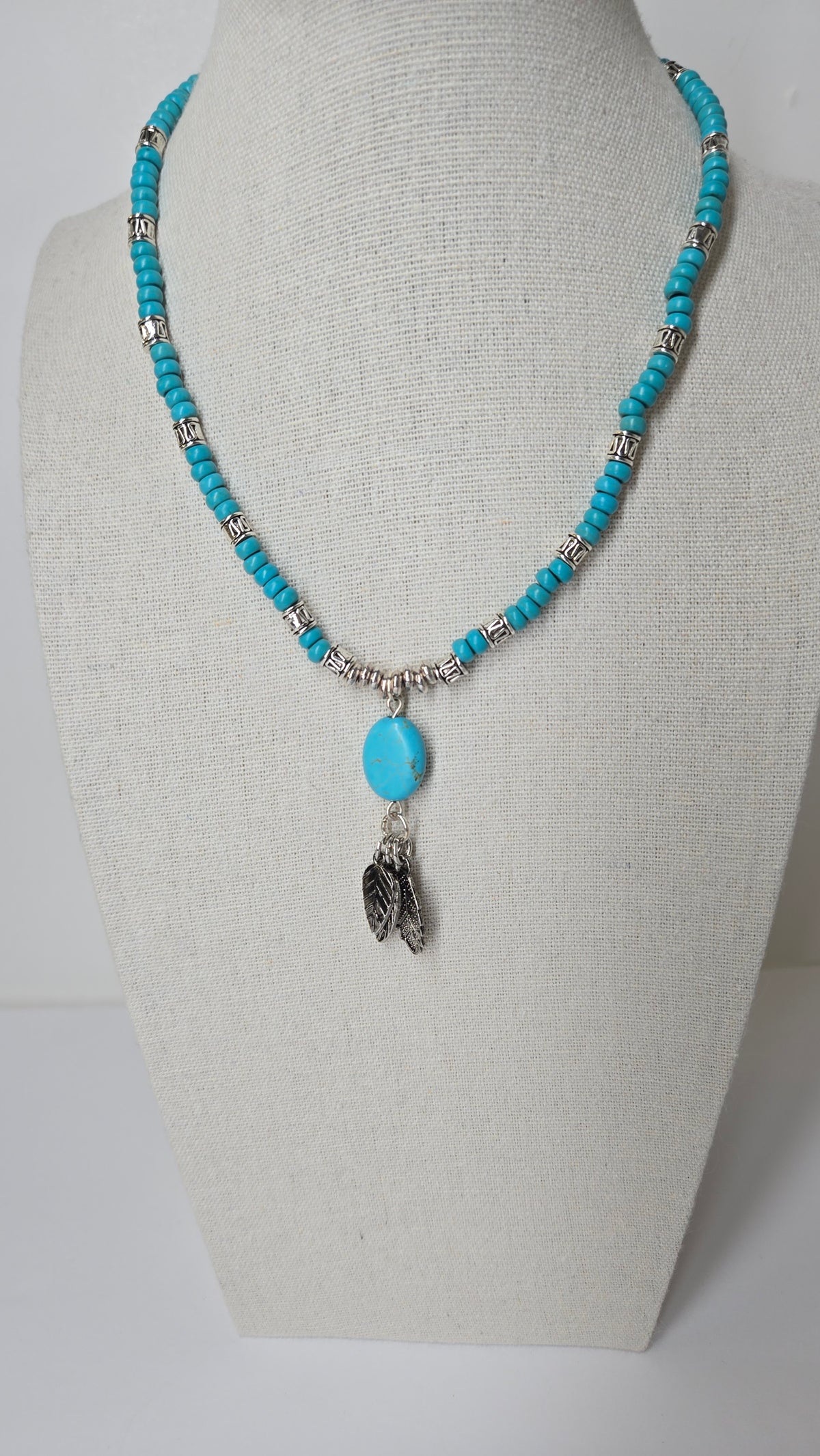 Turquoise Queen Necklace with turquoise, silver accents and leaf charms, view 2