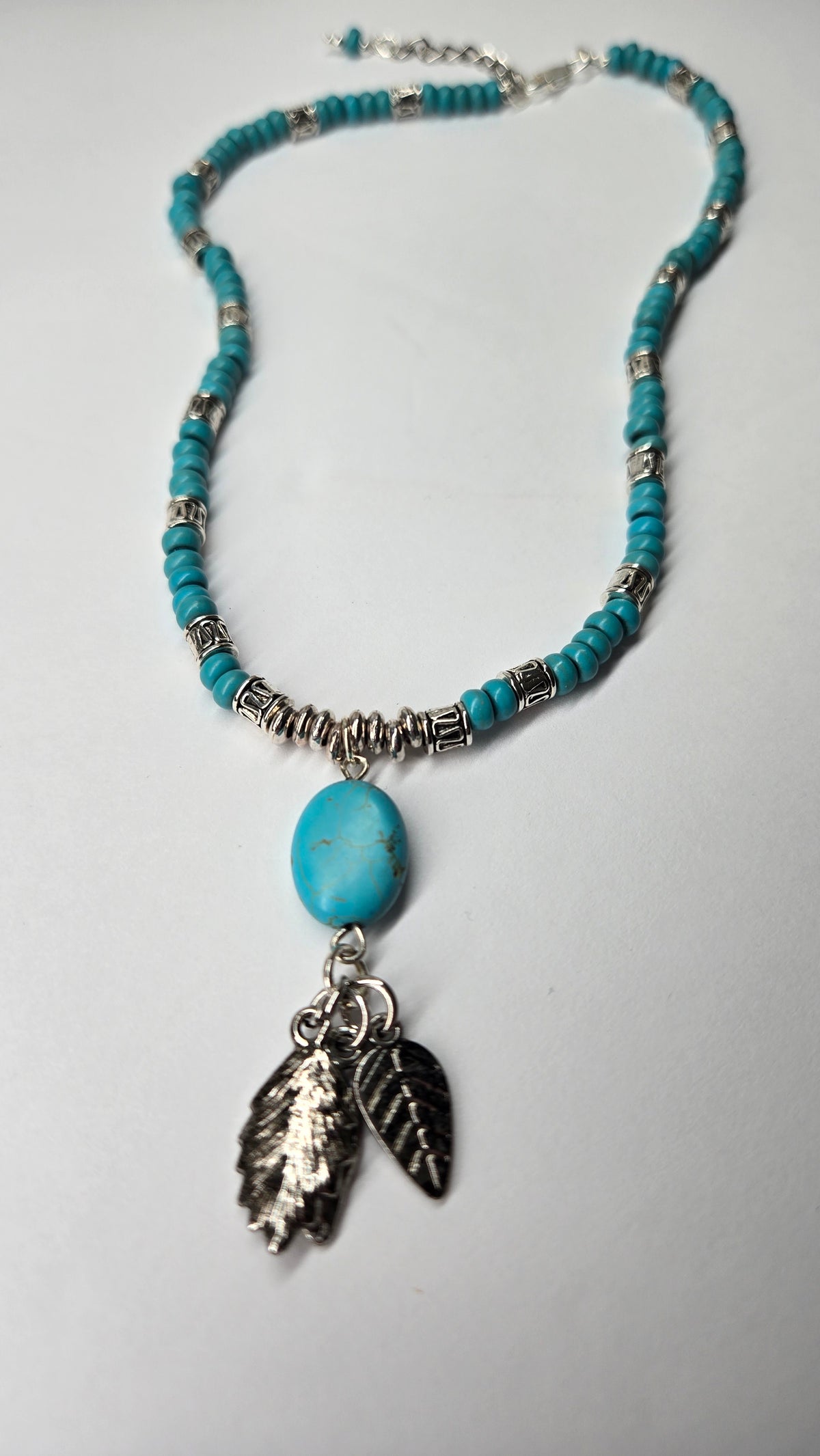 Turquoise Queen Necklace with turquoise, silver accents and leaf charms, view 5