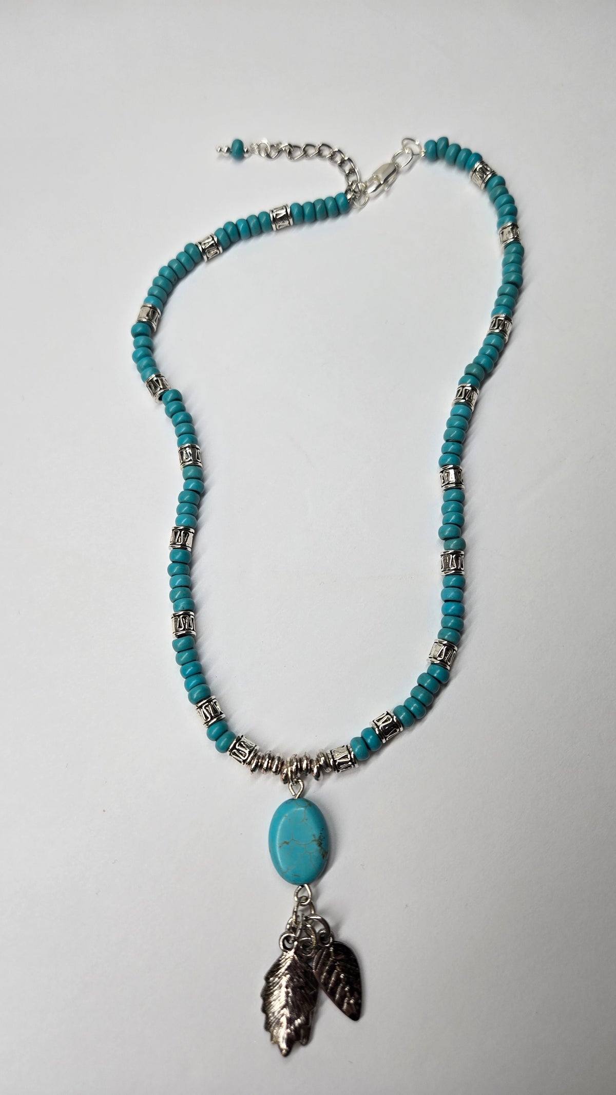 Turquoise Queen Necklace with turquoise, silver accents and leaf charms, view 6