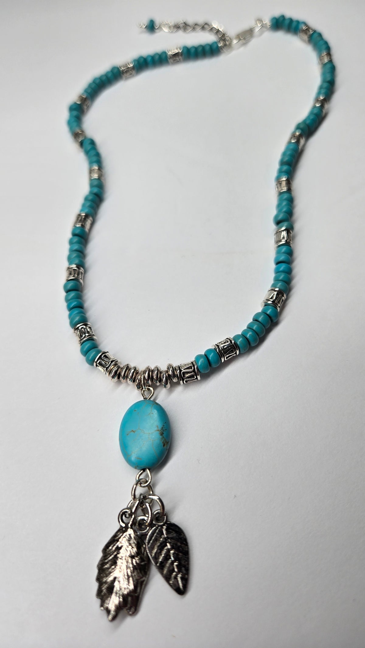 Turquoise Queen Necklace with turquoise, silver accents and leaf charms, view 7