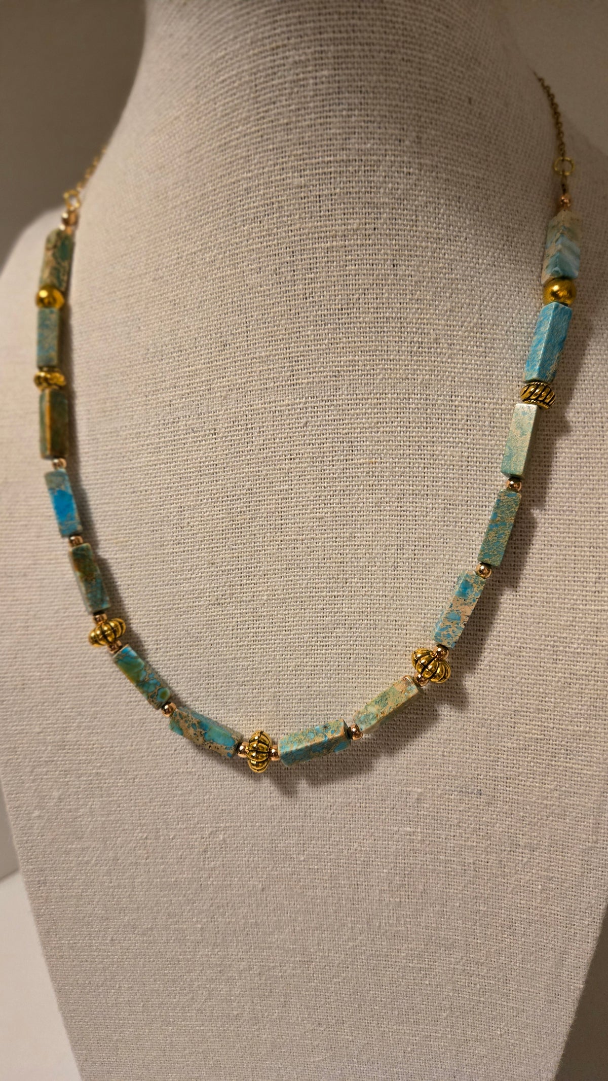 Ocean Whisper Necklace of turquoise-blue rectangular beads with gold-tone spacers, view 7