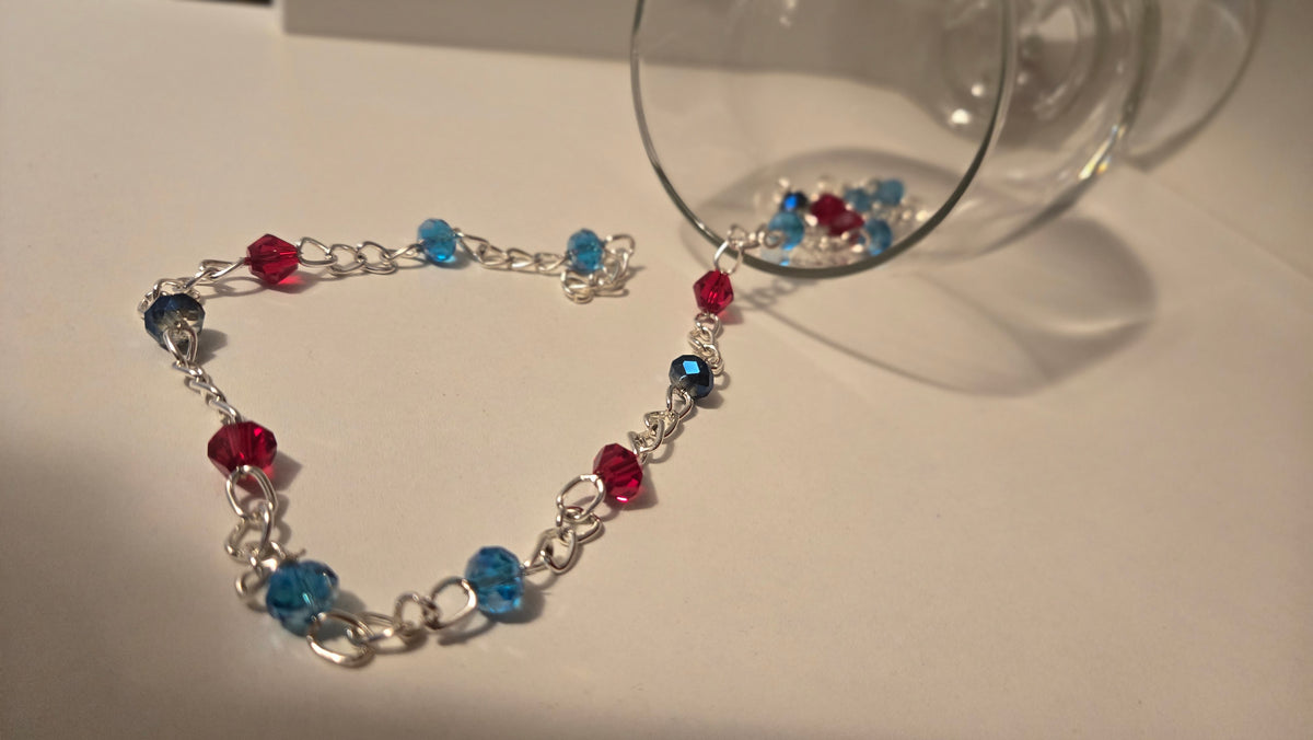 Dual Elegance Necklace with deep blue and red beads on a silver chain, view 5
