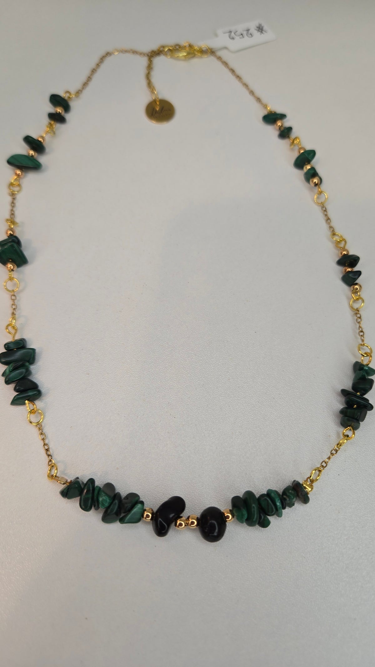 Green Harmony Necklace with dark green chip stones and black oval beads on gold-tone chain, view 3