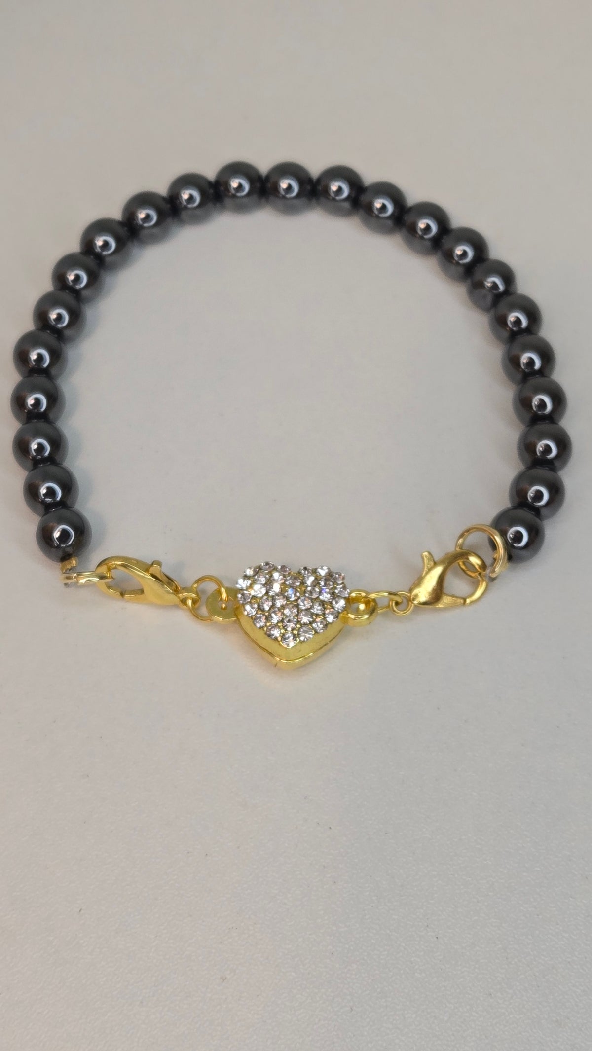 Hematite Heart Bracelet with polished heart-shaped hematite beads, view 2