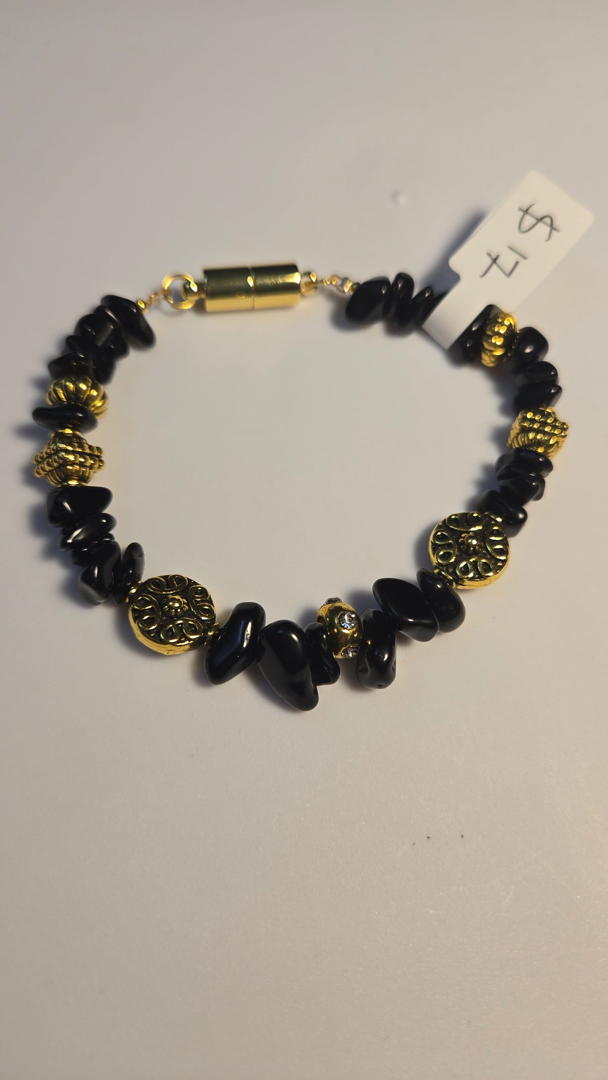 Black Royal Bracelet with black stones and gold-tone accents