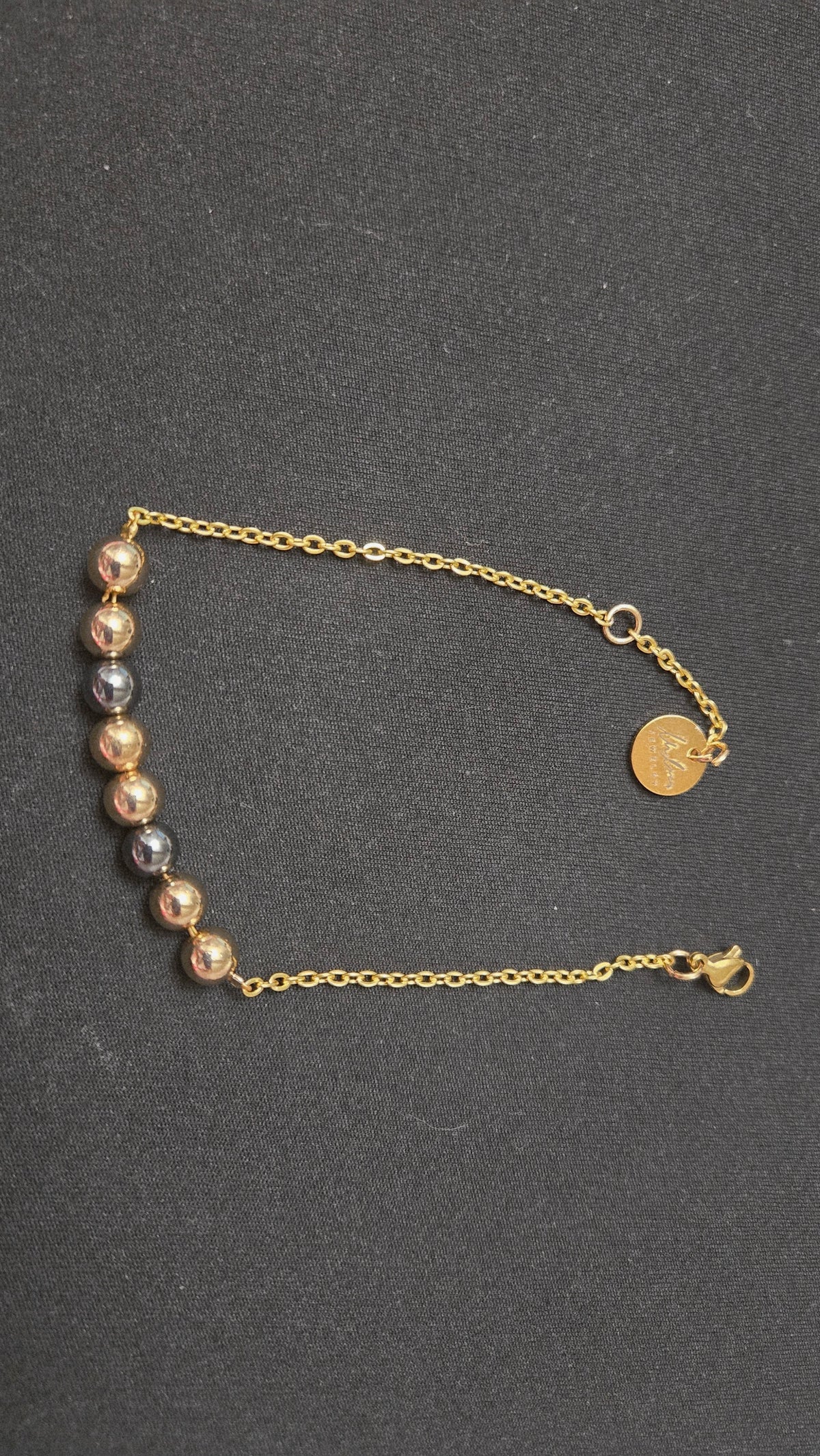 Mixed-Tone Bracelet with gold-tone chain, metallic beads and a round charm, view 2