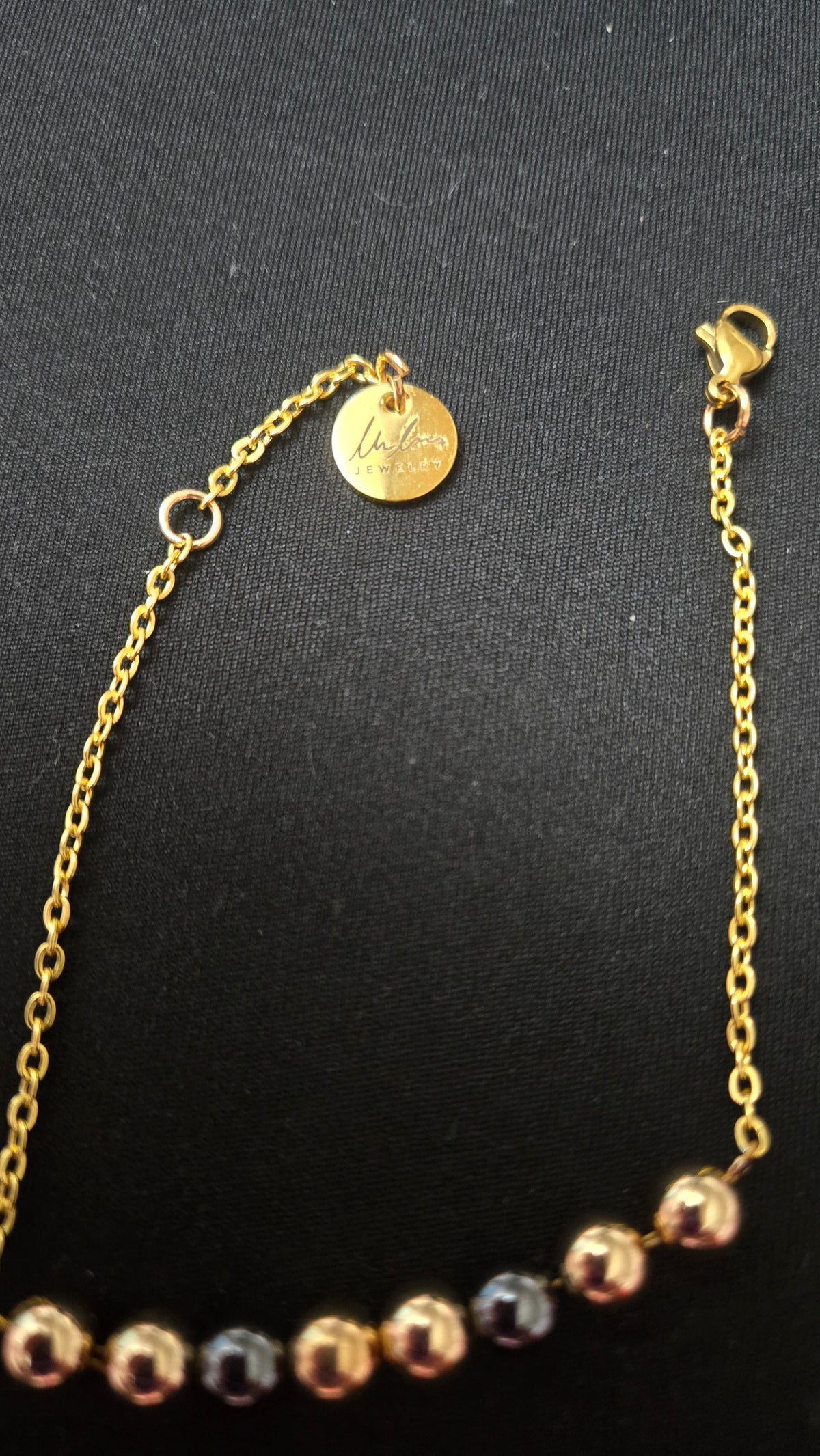 Mixed-Tone Bracelet with gold-tone chain, metallic beads and a round charm, view 7