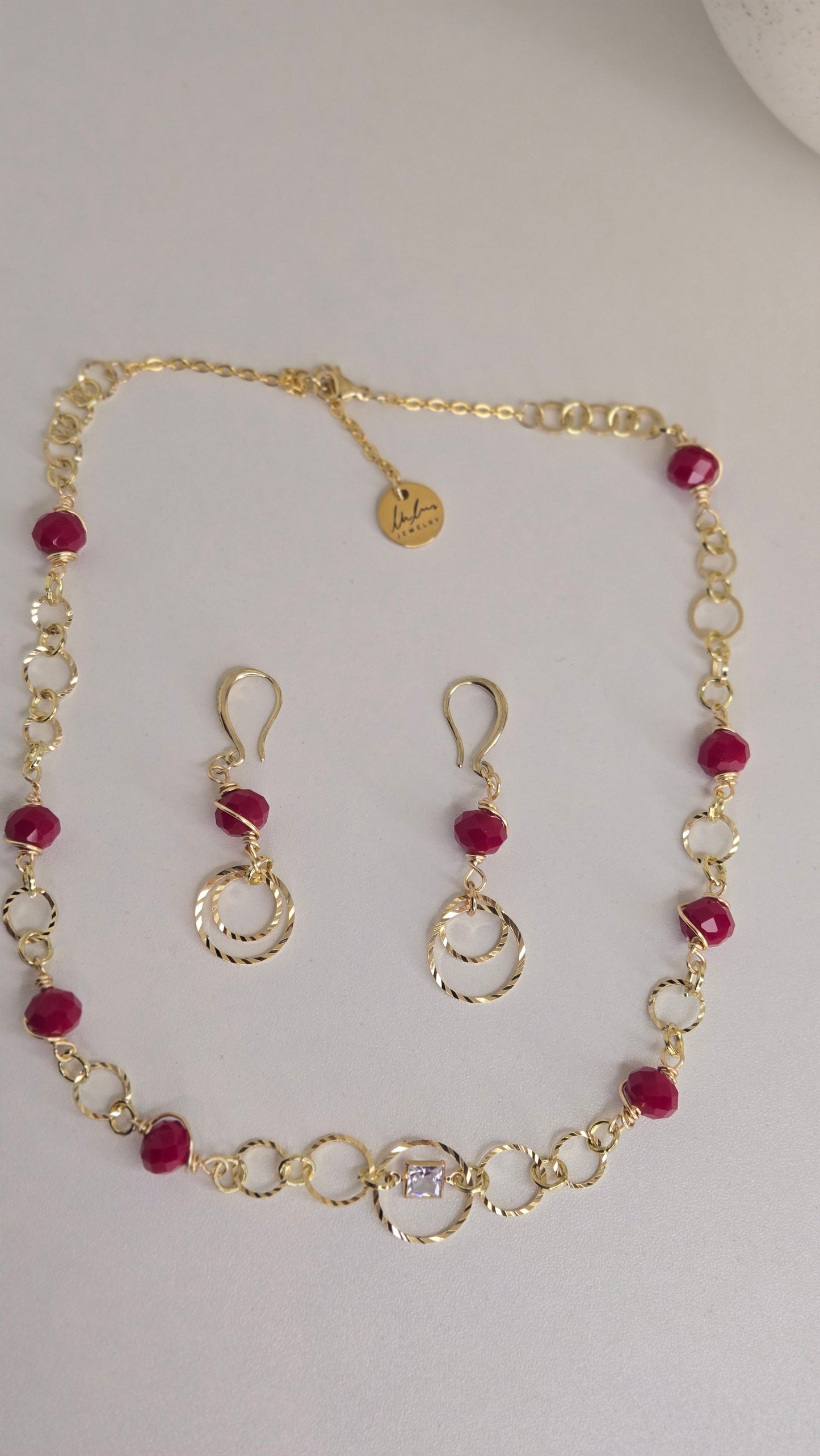 Golden Ruby Charm Set styled with fashionable outfits
