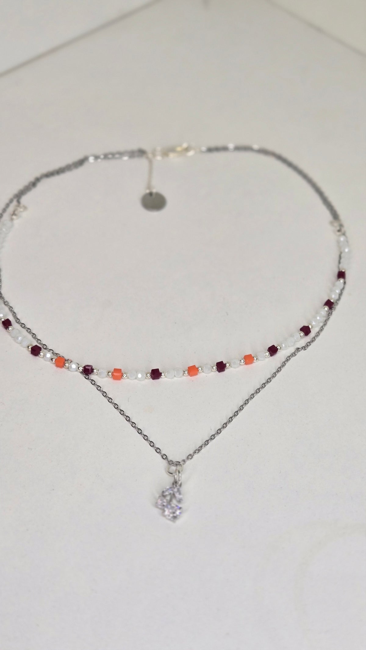 Aurora Layers Necklace with silver chain, colorful beads and sparkling pendant, view 5