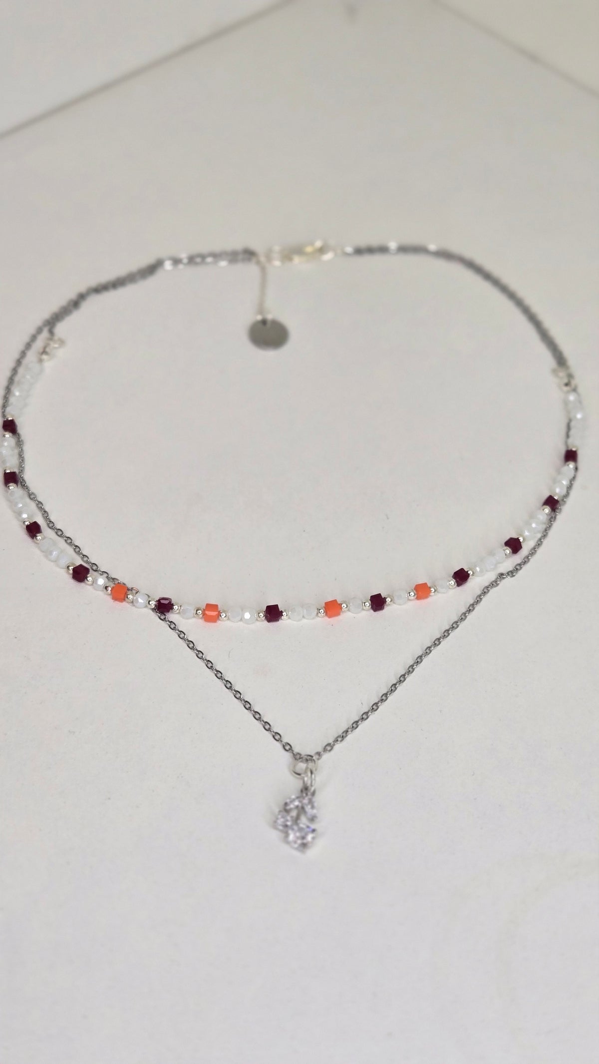 Aurora Layers Necklace with silver chain, colorful beads and sparkling pendant, view 4
