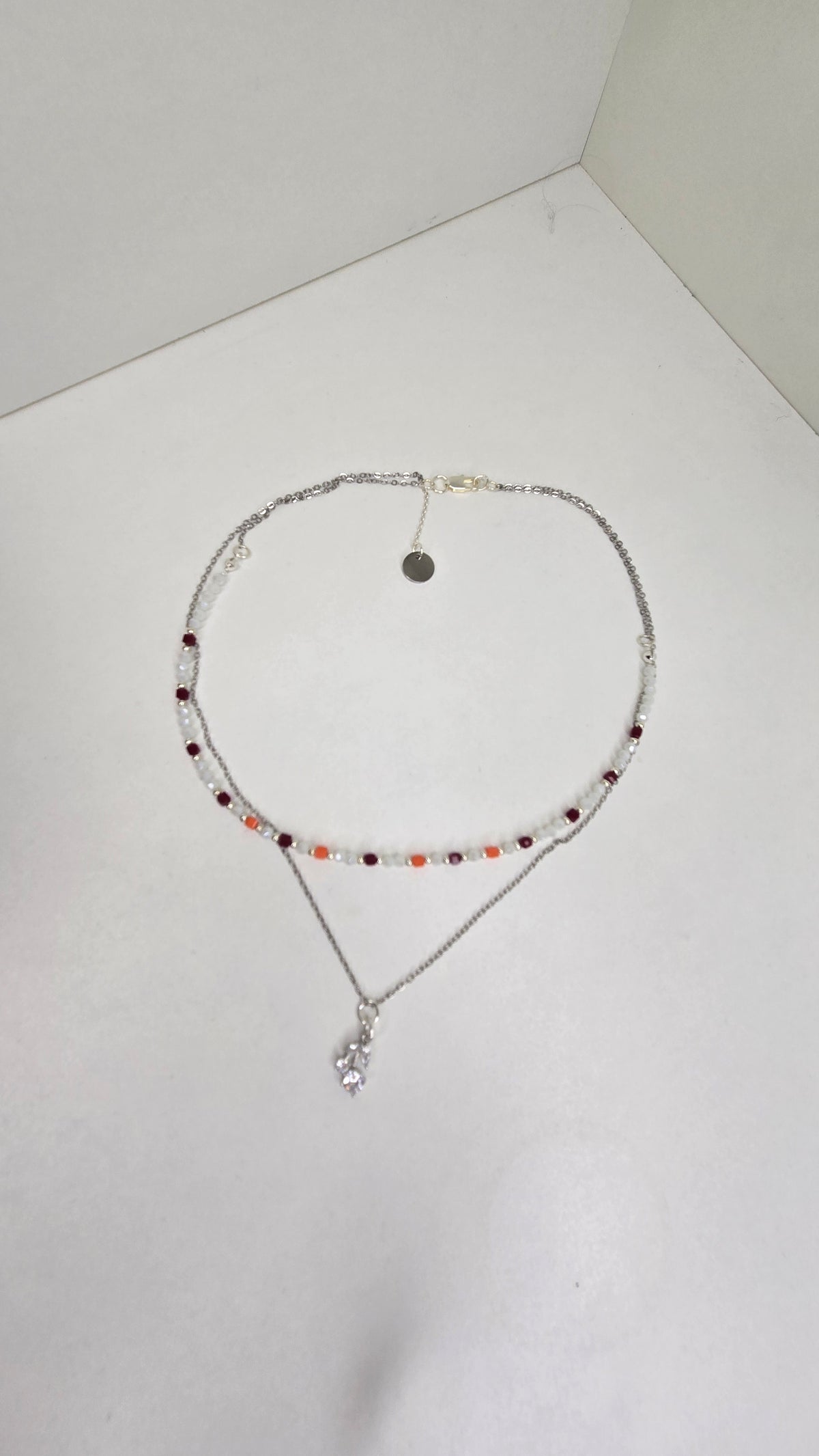 Aurora Layers Necklace with silver chain, colorful beads and sparkling pendant, view 2