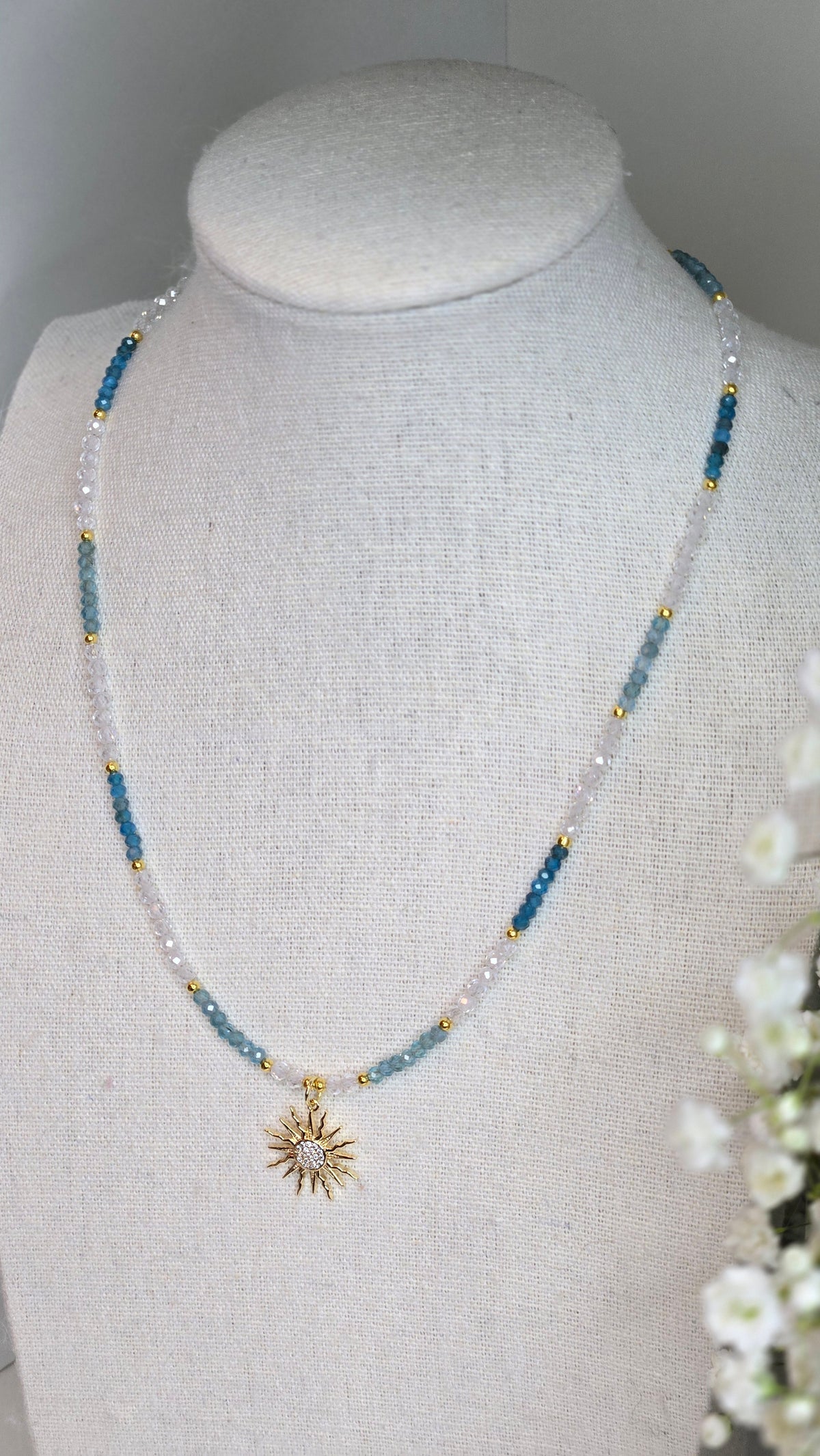 Sunlight Breeze Necklace with blue apatite stones and a cubic zirconia sun pendant, view 6