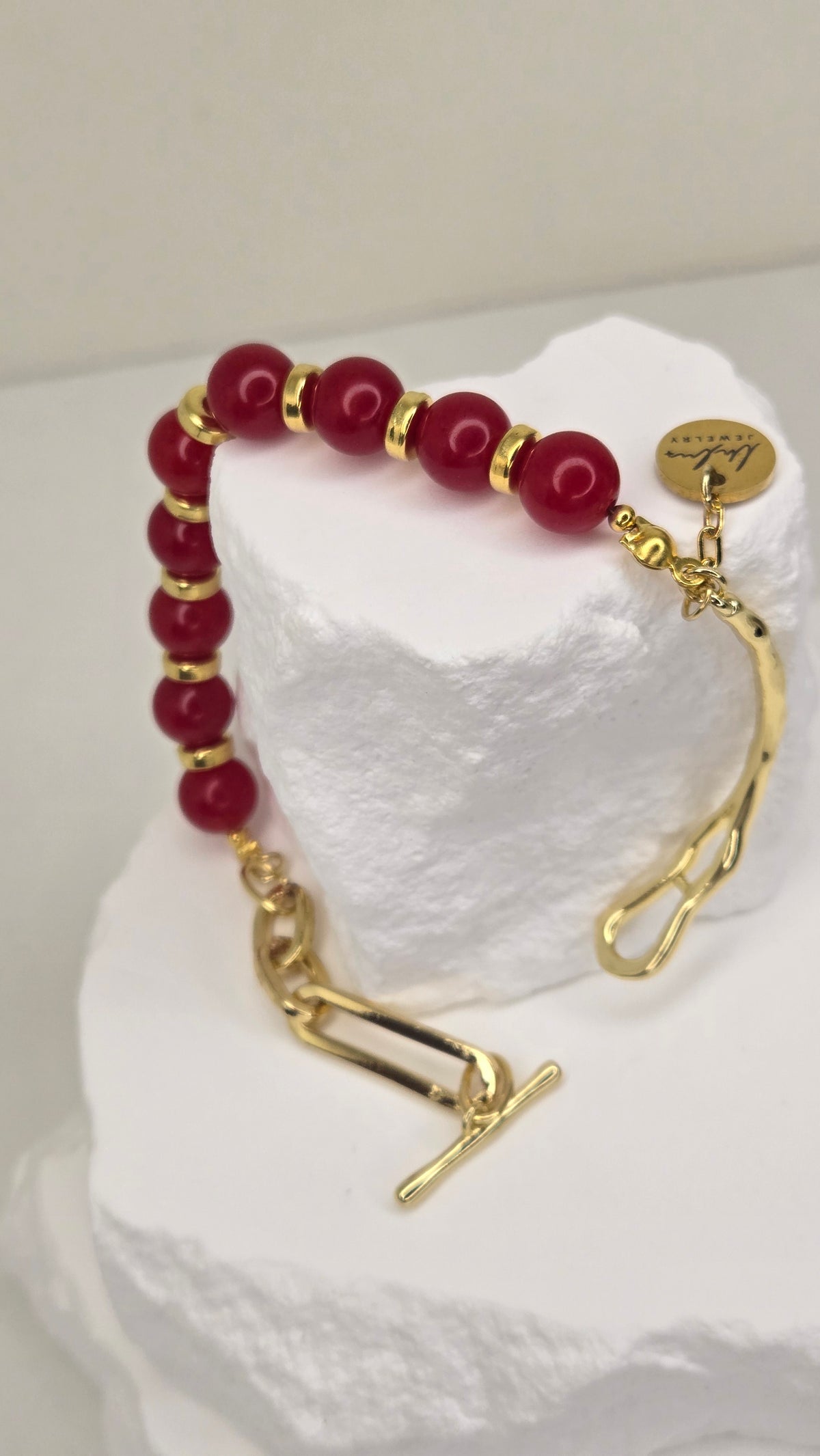 Crimson Glow Bracelet with red jade, gold-tone spacers and a toggle clasp, view 5