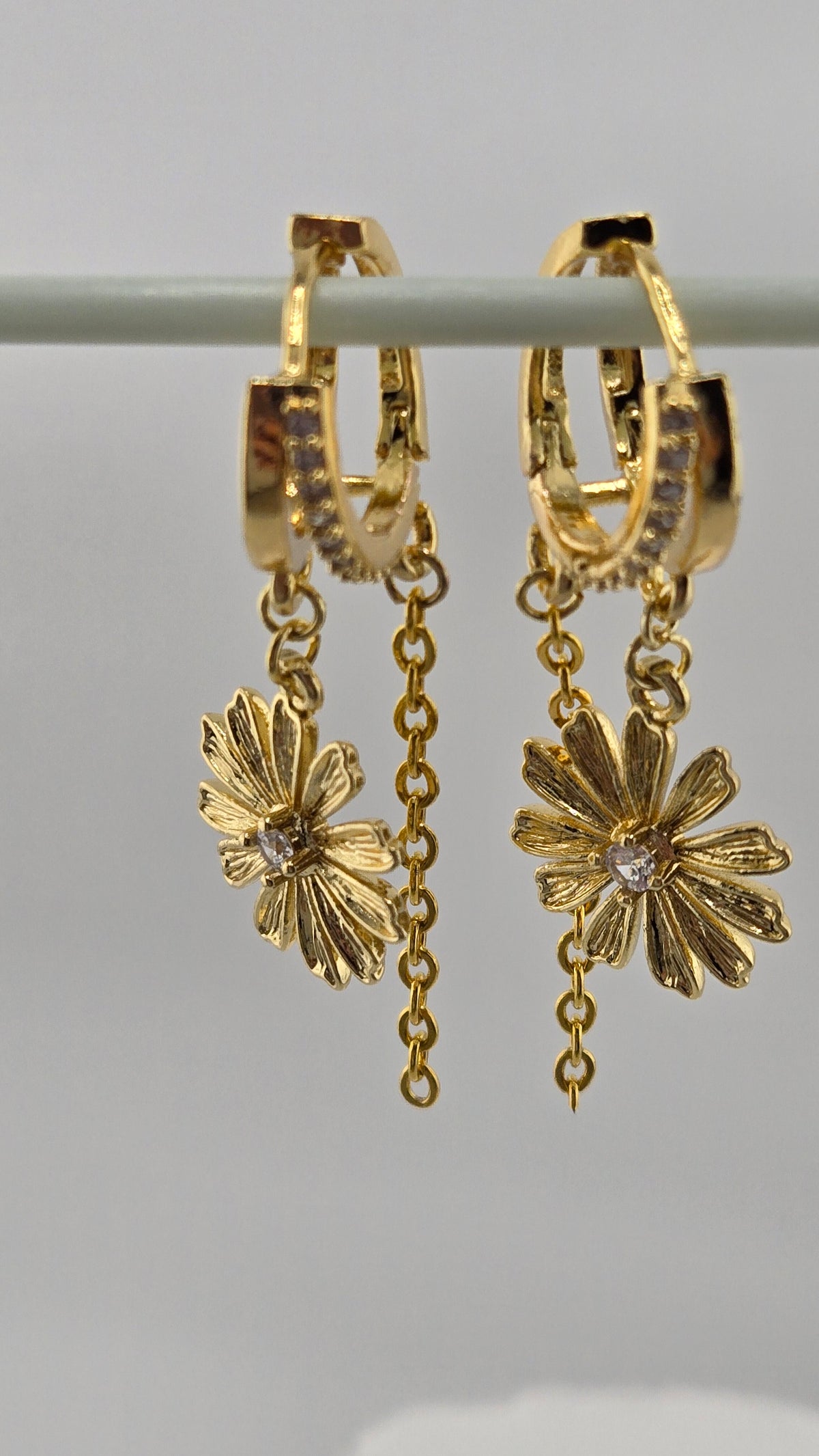 Daisy Cascade Earrings with dangling daisy charms on gold-tone chains