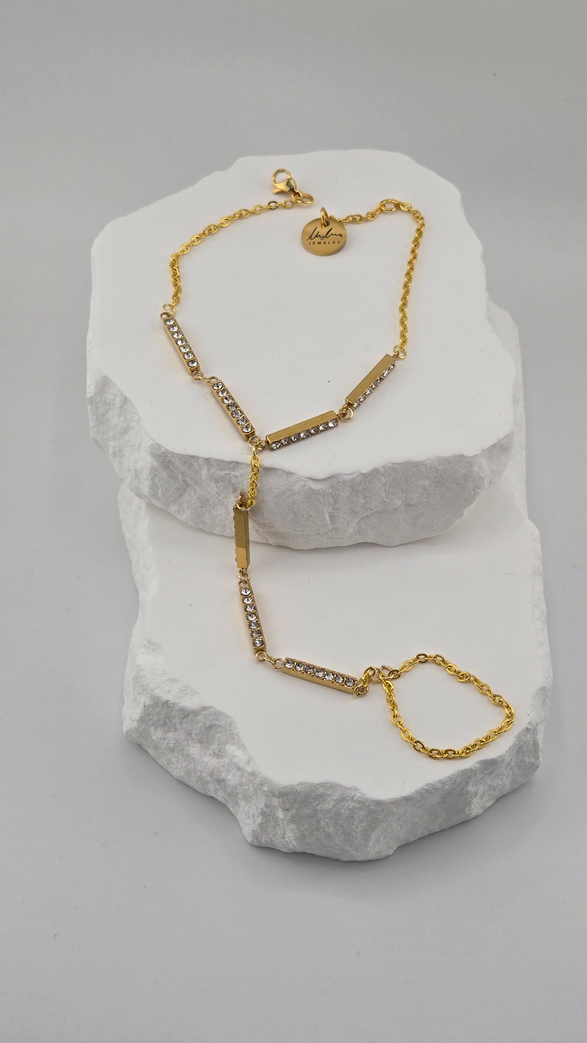 Golden Crystal Bar Hand Chain with rectangular gold-tone bars and crystal details