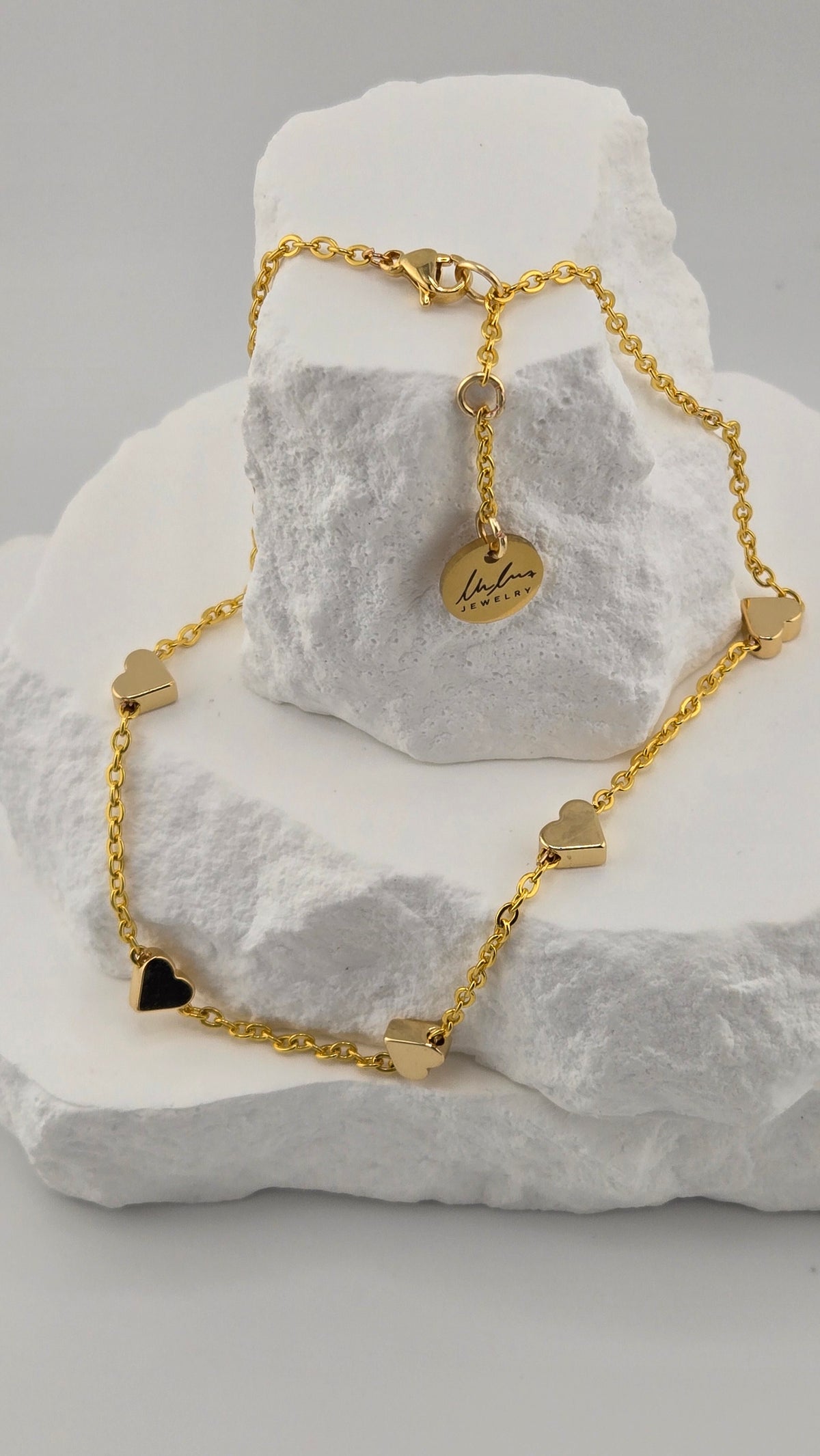 Golden Love Anklet with five polished hearts on a fine gold-tone chain, view 3