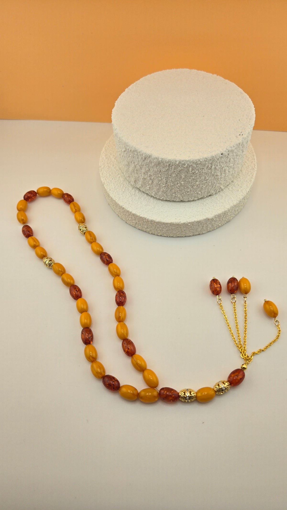 Golden Honey Tasbih with amber and honey-toned beads and ornate gold-tone spacers, view 7