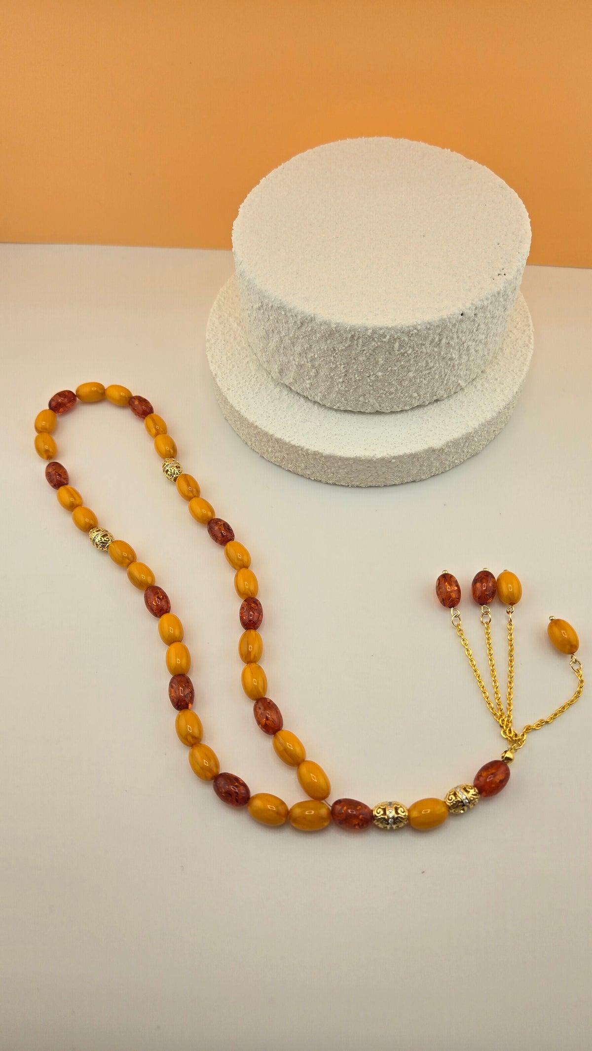 Golden Honey Tasbih with amber and honey-toned beads and ornate gold-tone spacers, view 6