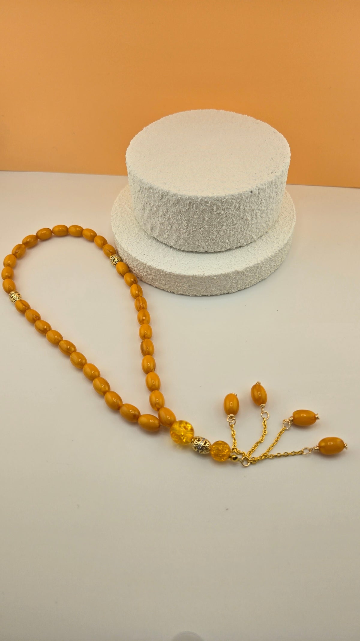 Golden Honey Tasbih with amber and honey-toned beads and ornate gold-tone spacers, view 2
