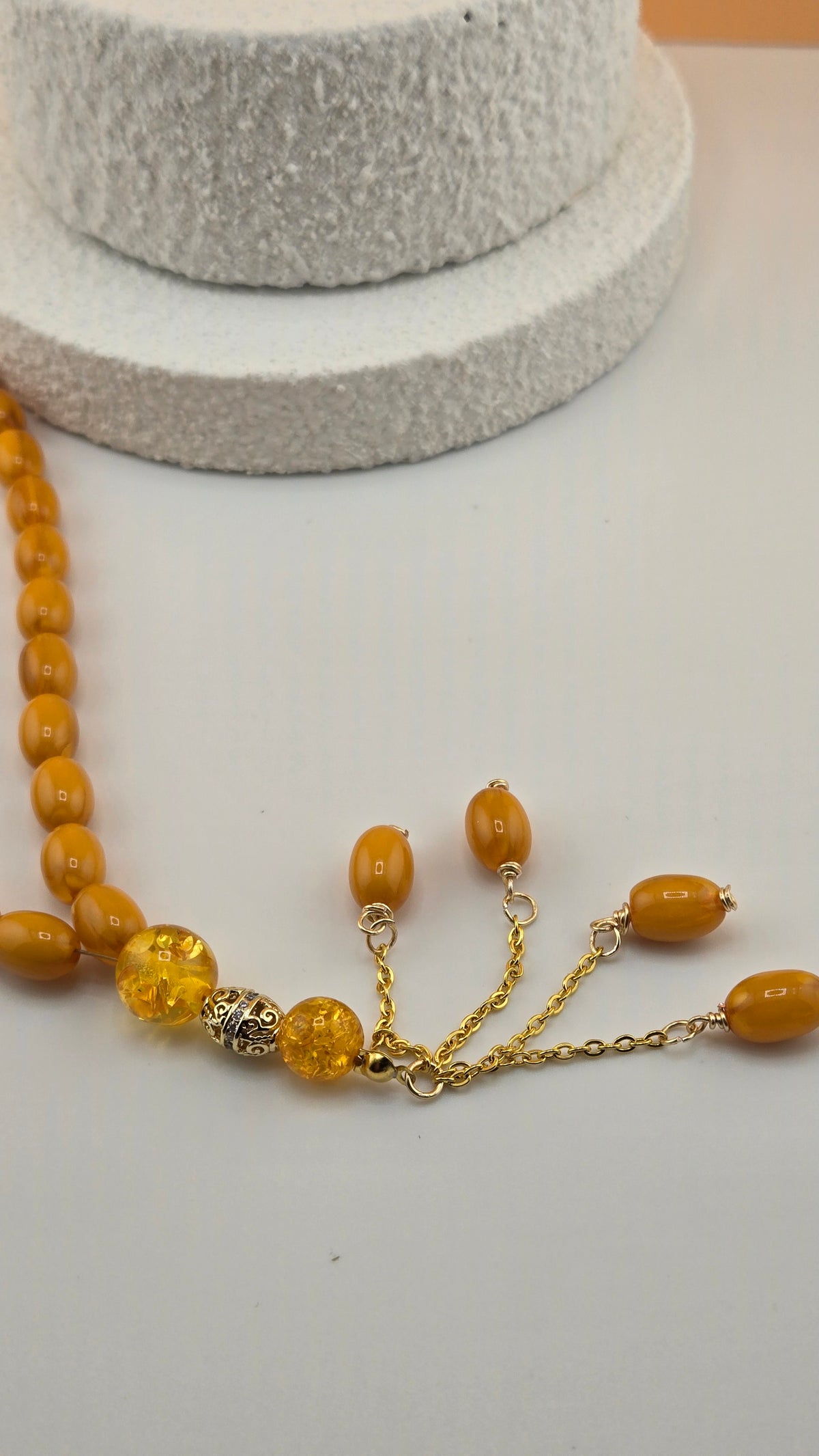 Golden Honey Tasbih with amber and honey-toned beads and ornate gold-tone spacers, view 9