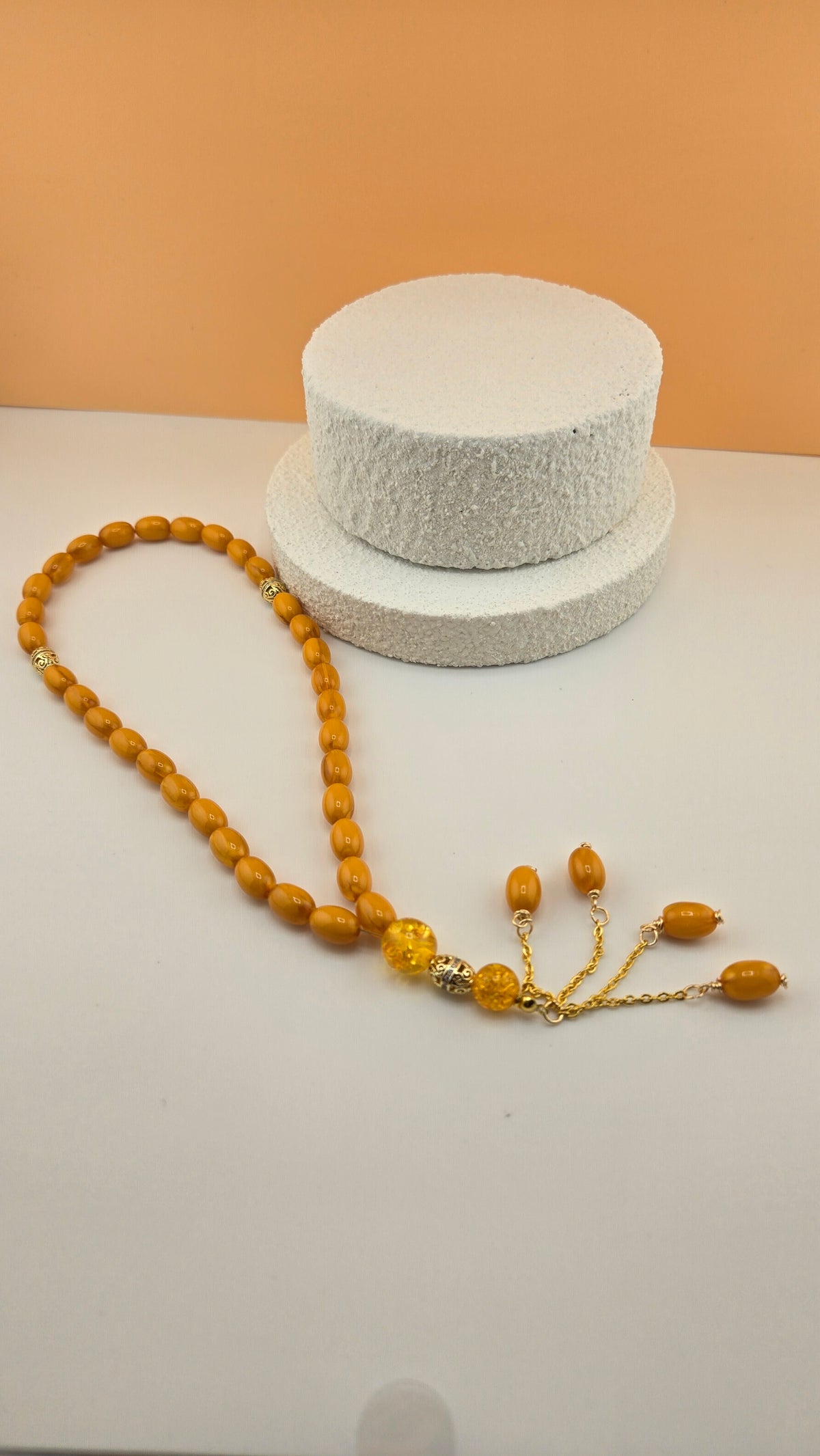 Golden Honey Tasbih with amber and honey-toned beads and ornate gold-tone spacers, view 11