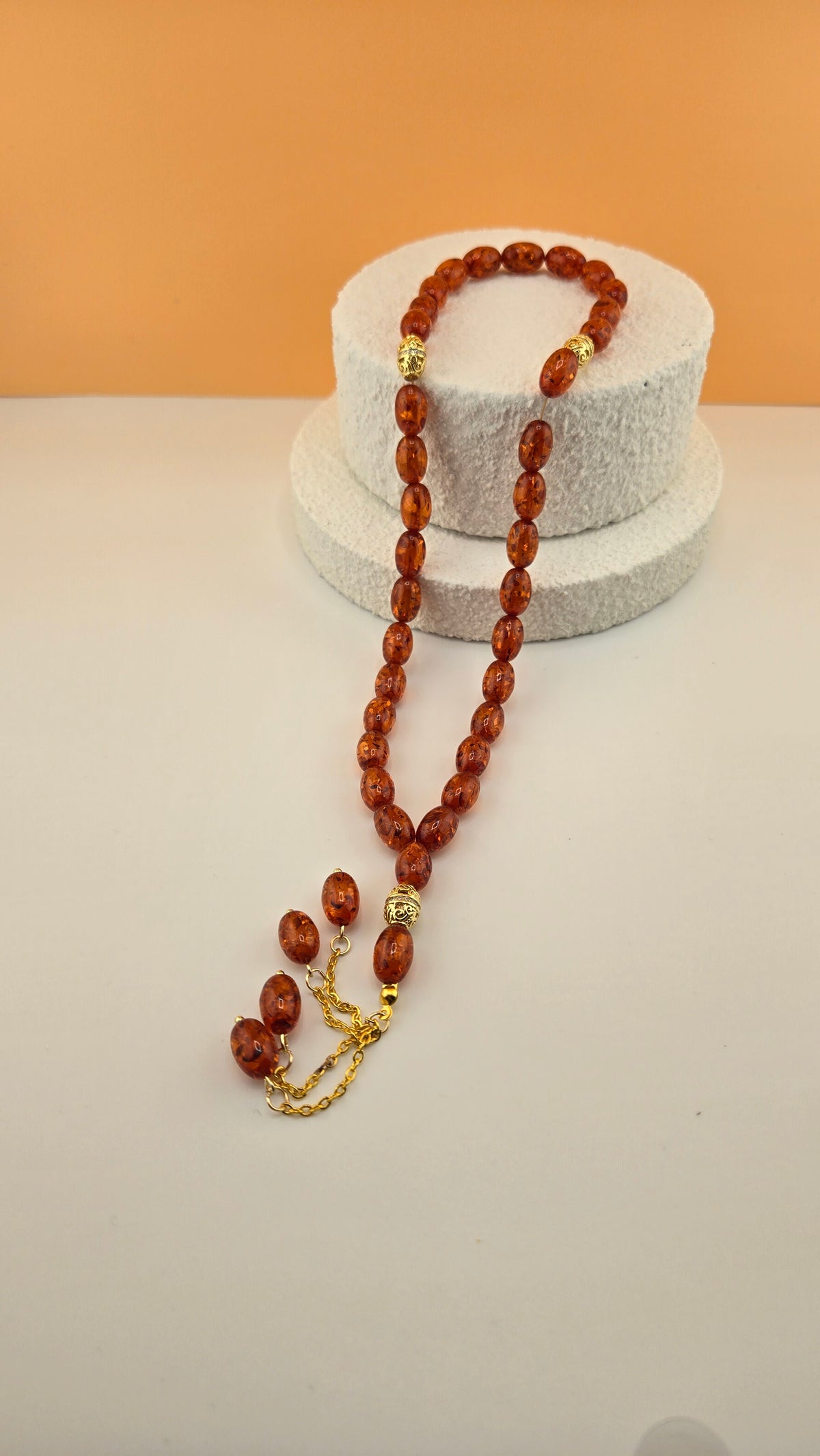 Golden Honey Tasbih with amber and honey-toned beads and ornate gold-tone spacers, view 5