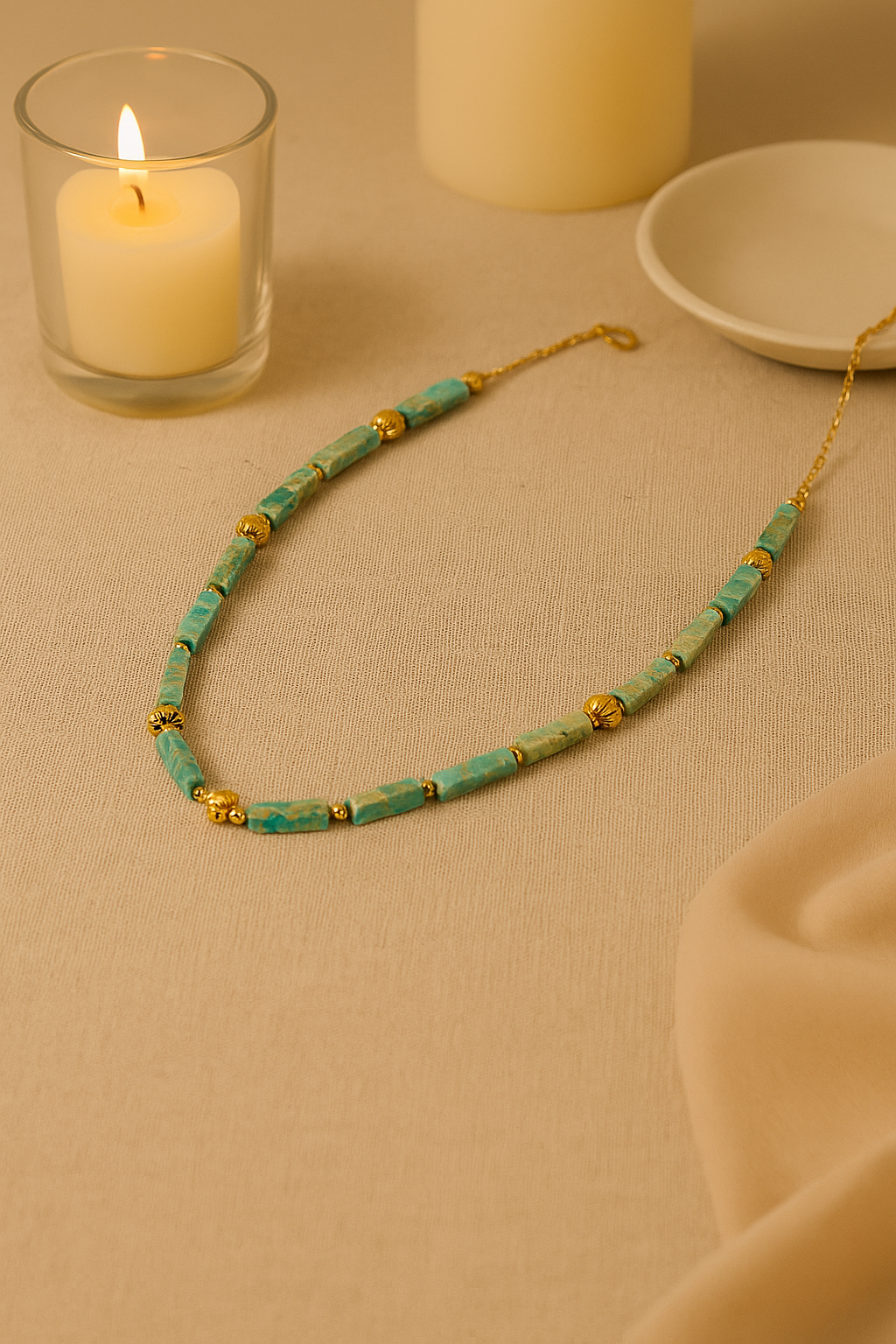 Ocean Whisper Necklace of turquoise-blue rectangular beads with gold-tone spacers, view 2