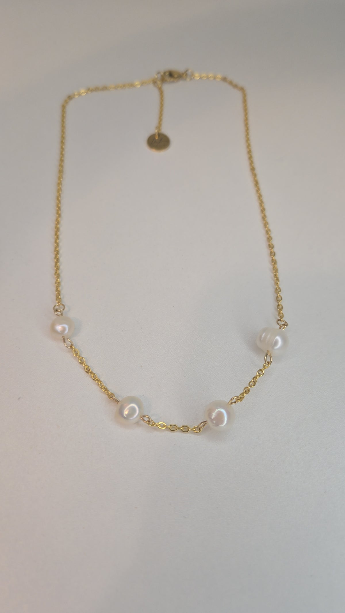 Golden Pearl Chain Necklace with fine gold-tone chain and pearl accents