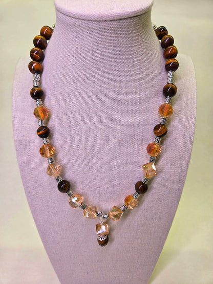 Tiger Glow Necklace with amber-hued crystals, brown beads and a double pendant, view 6