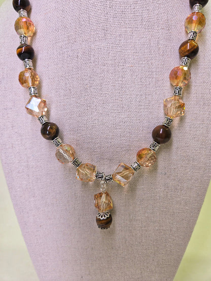 Tiger Glow Necklace with amber-hued crystals, brown beads and a double pendant, view 7