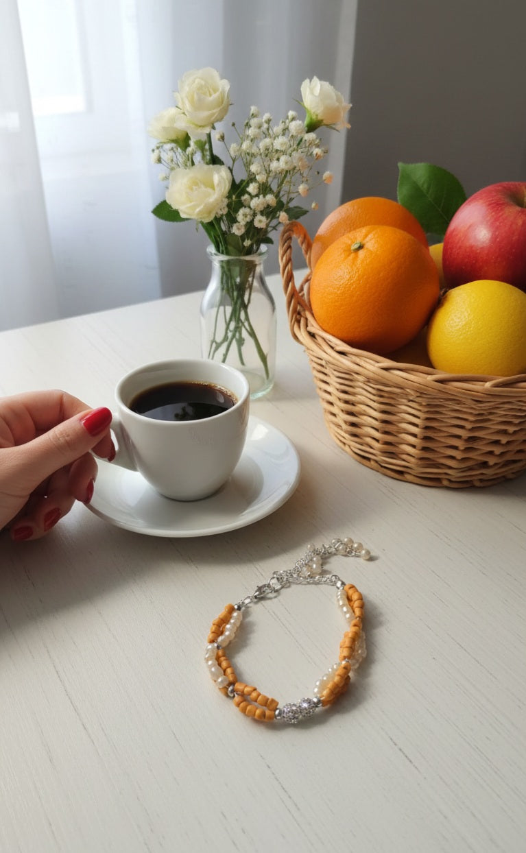 Coral Sun Bracelet styled with a casual outfit, showing its versatility for everyday wear.