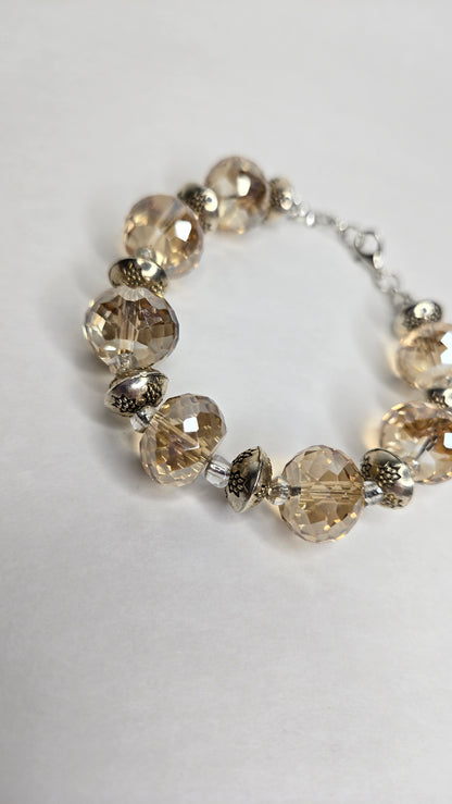 Elegance bracelet with faceted champagne-colored beads and patterned silver-tone spacers, view 2