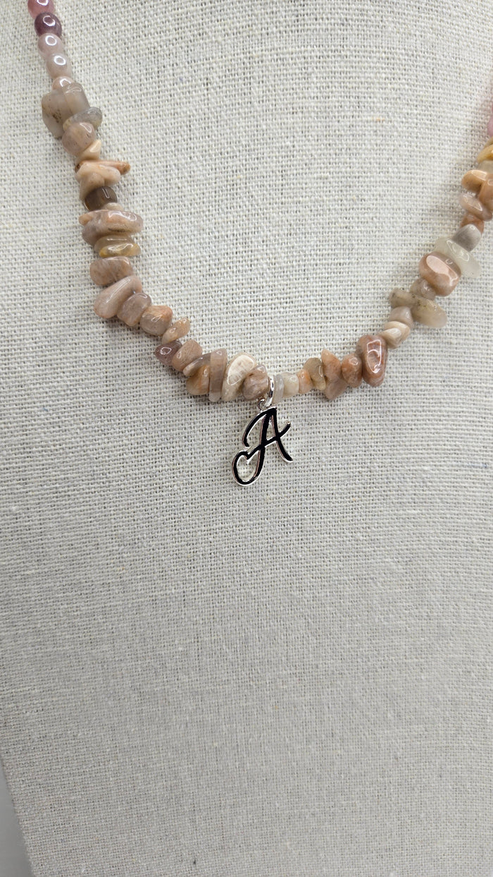 Natural Stone Necklace with peach and pink stone chips and a silver-tone letter A charm