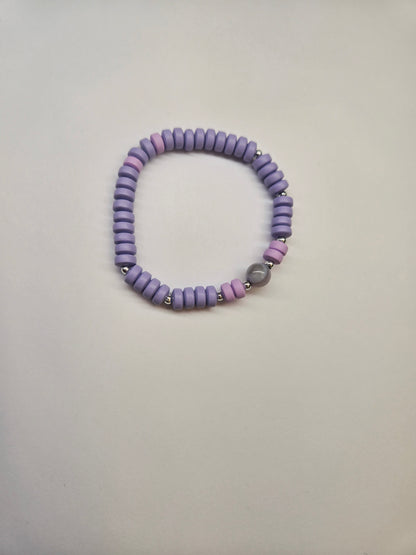 Minimalist Heishi Bead Bracelet with purple and pink heishi beads and a round stone bead