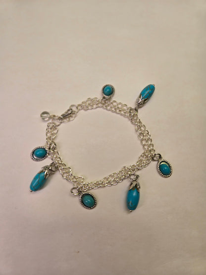 Turquoise Chime Bracelet with silver-tone double chain and turquoise oval and drop charms