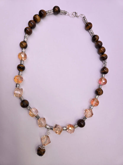 Tiger Glow Necklace with amber-hued crystals, brown beads and a double pendant, view 4