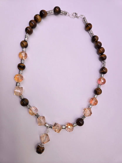 Tiger Glow Necklace with amber-hued crystals, brown beads and a double pendant, view 5