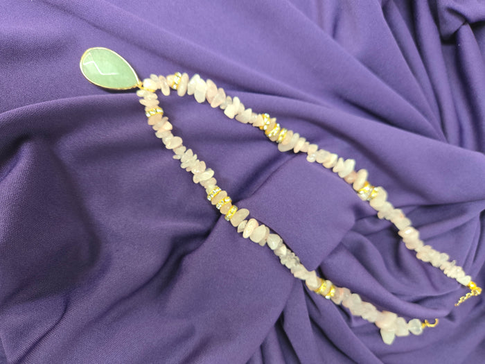 Rose Nectar Necklace with rose quartz chips, gold-tone spacers and a green teardrop pendant