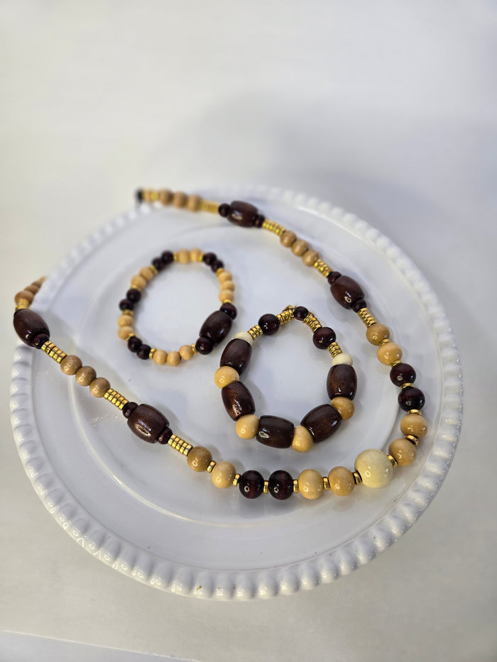 Sahara Charm Set, a necklace and two bracelets of brown wooden beads with gold-tone accents