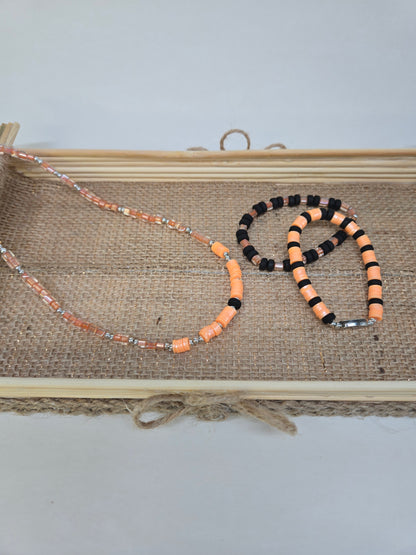 Orange Pulse Beaded Jewelry necklace and two bracelets in orange and black beads, view 6
