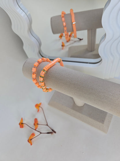 Sun Bloom Orange Beaded Jewelry, two orange disc bead bracelets with gold-tone rondelles