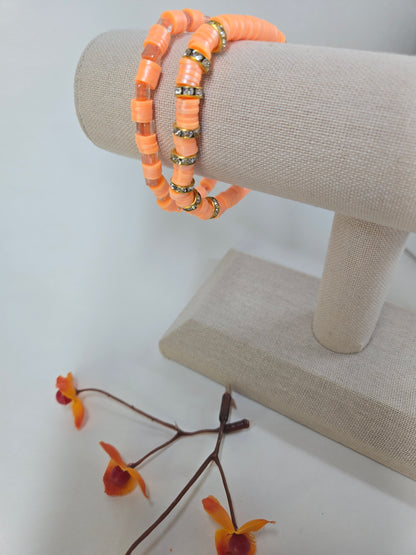 Sun Bloom Orange Beaded Jewelry, two orange disc bead bracelets with gold-tone rondelles, view 3