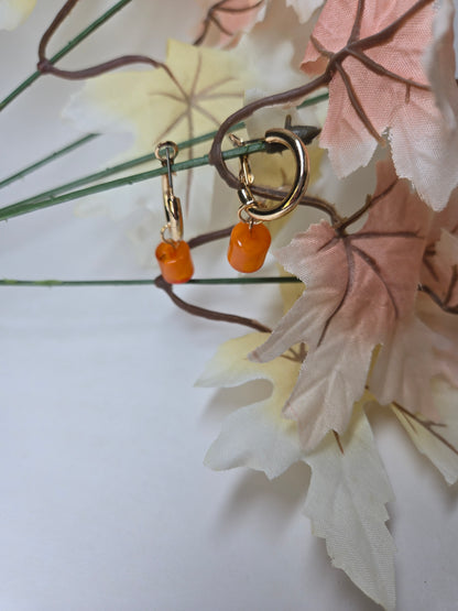 Amber Drop Earrings with gold-tone hoops and faceted orange cube beads