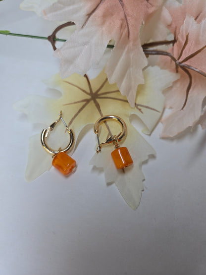 Amber Drop Earrings with gold-tone hoops and faceted orange cube beads, view 3